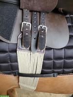 Gebrauchter Schnursattelgurt aus reinem Leinen mit Lederkappen